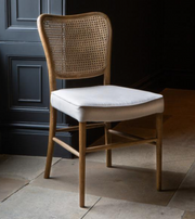 Anouk Dining Chair in Natural Linen with Rattan Back