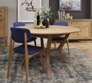 The Gibson Round Extending Dining Table